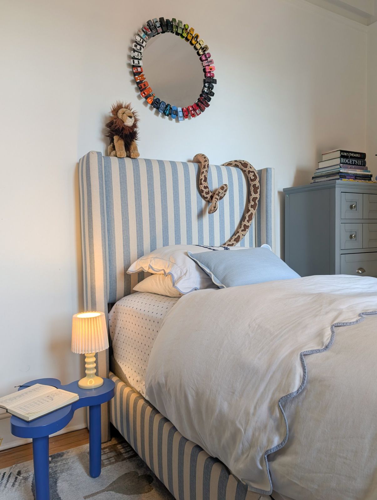 Child bedroom with striped upholstered bed